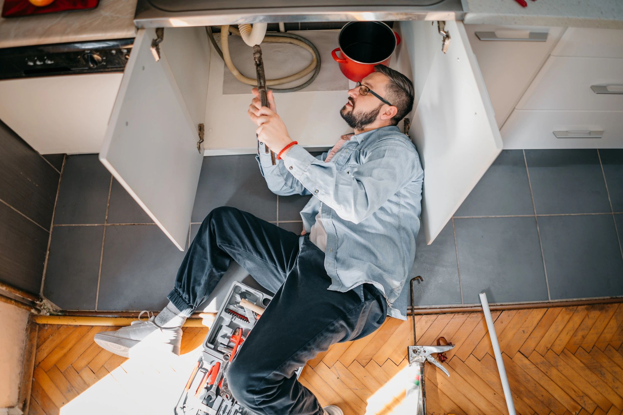 Plumber responding to an emergency repair call