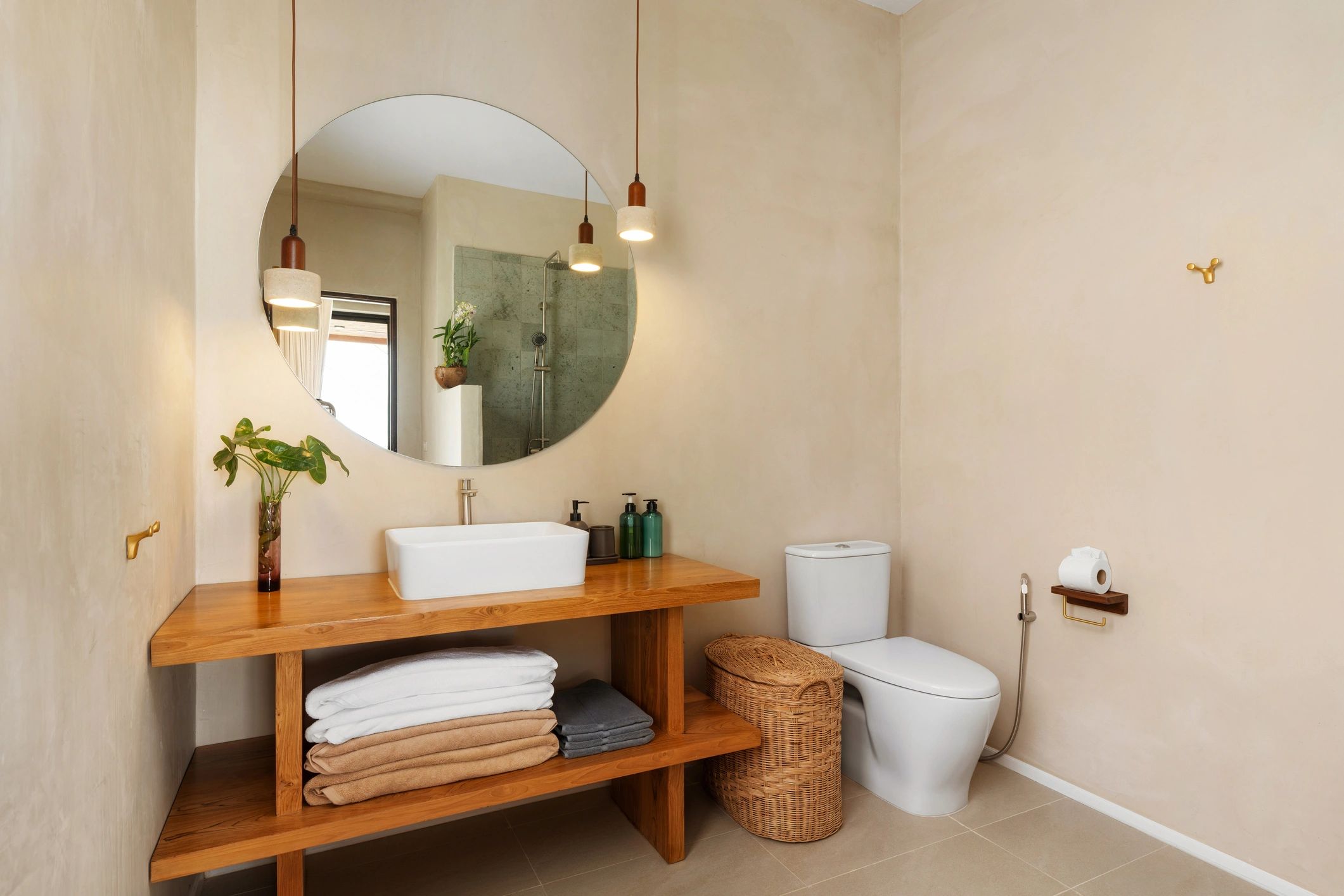 Clean modern bathroom with wooden vanity and neutral finishes